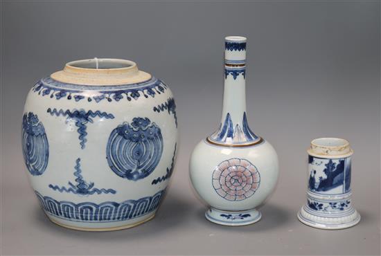 A Chinese blue and white jar, a similar pot and in underglaze blue and copper red vase, Kangxi and later